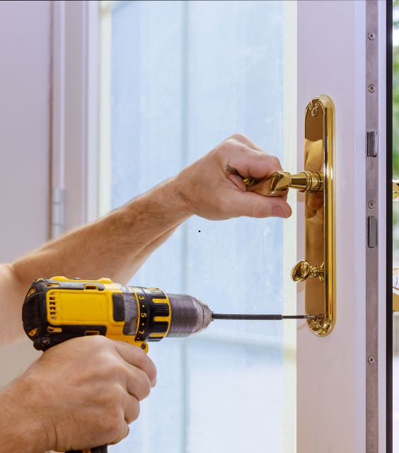 Close up of businessman hand entering security system code.